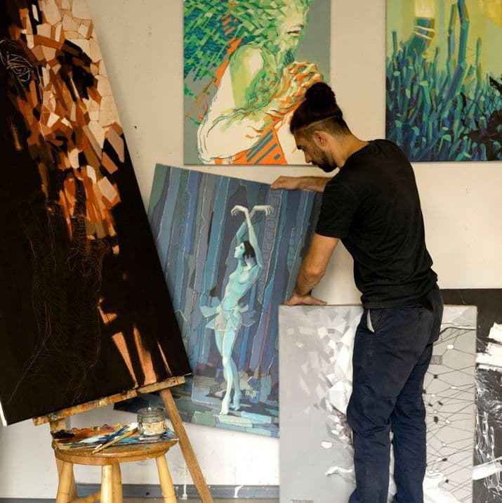 Aleksei Rumiantsev and his paintings in studio