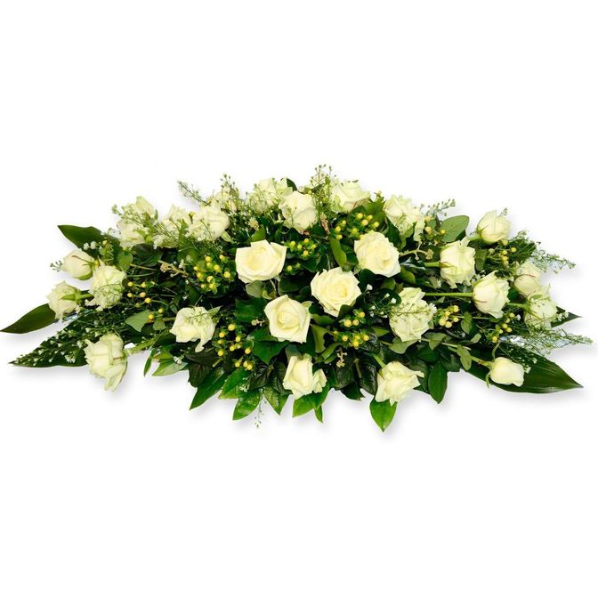 Траурная композиция на гроб из белых роз