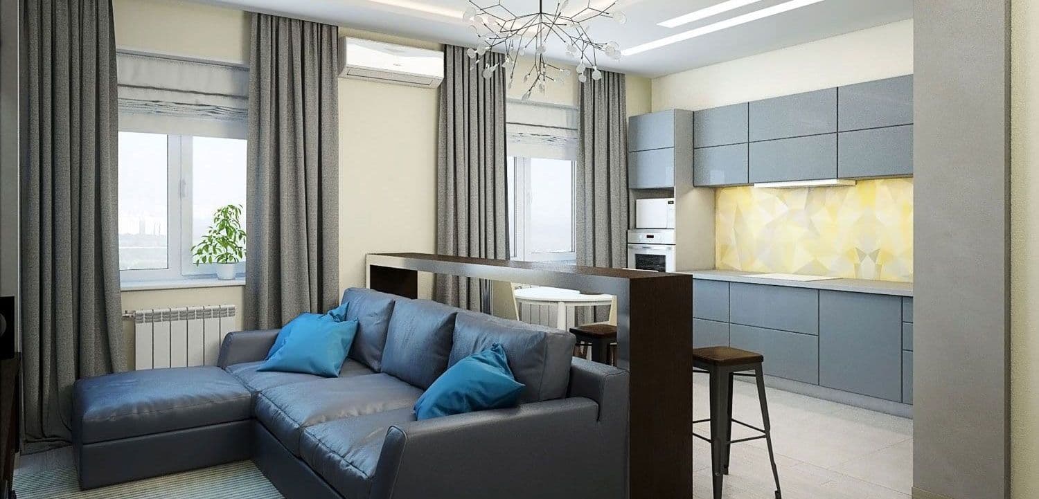 Современный дизайн кухни гостиной в приглушенных тонах, с синим диваном, синей кухней, барной стойкой в стиле контемпорари