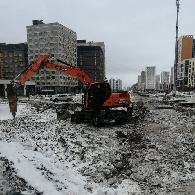 Аренда колёсного экскаватора с гидромолотом в Санкт-Петербурге, аренда колёсного экскаватора с планировочным ковшом, аренда спецтехники, аренда строительной техники спб